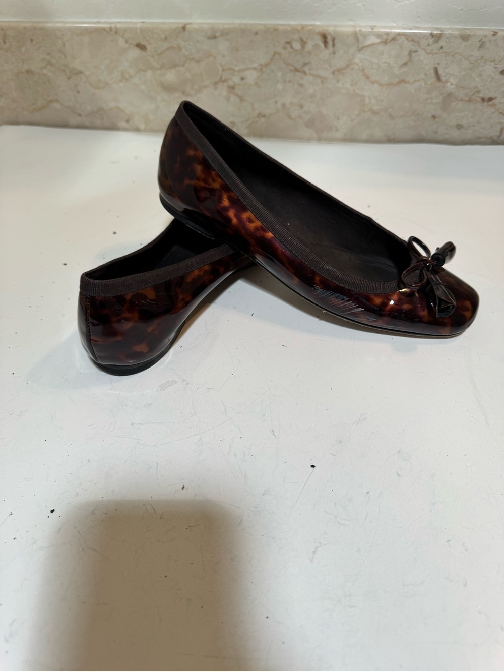 Stuart Weitzman Glossy Tortoiseshell Ballet Flats with Bow